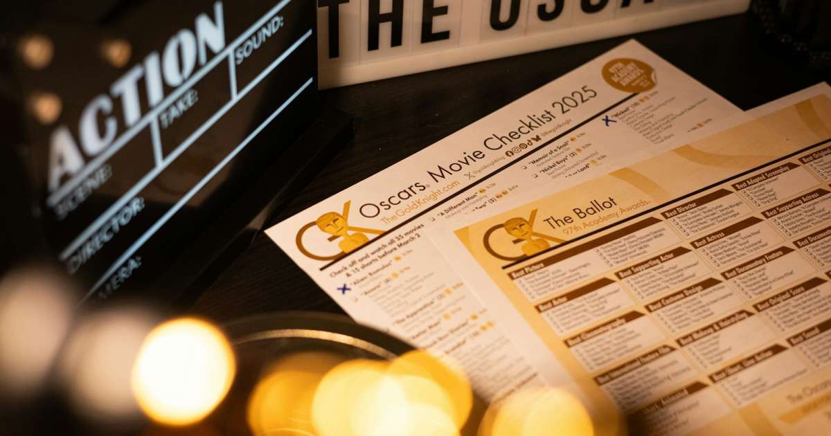 Oscars' Ratings Just Hit a New Low, And It's Ugly - A close up of a person's hand holding a remote control